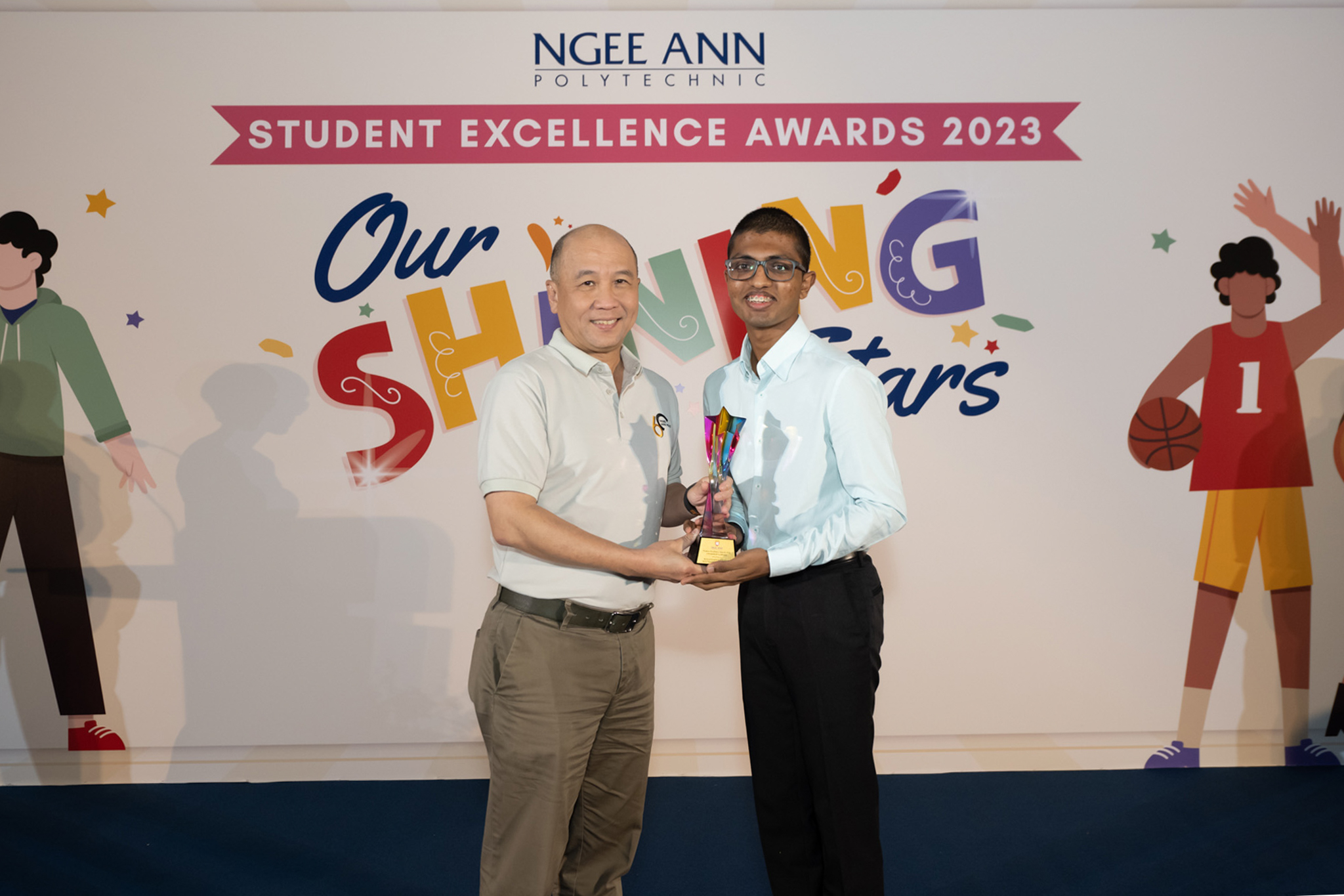 image of student receiving an award
