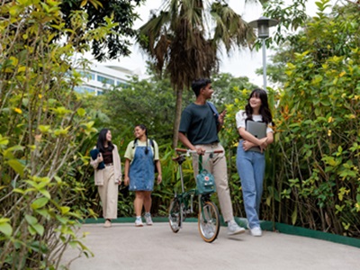 NP students walking along the Blk 56 garden