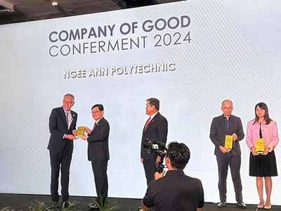 NP's PCEO receiving the prestigious Champion of Good Award
