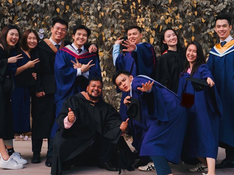 NP's BA alumni in their graduation gowns