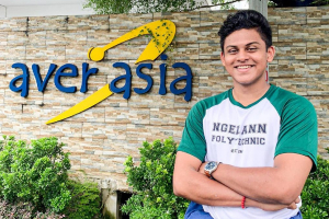 photo of student at the facade of Aver Asia