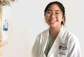 Headshot of Natalie Kui wearing NUS medical coat